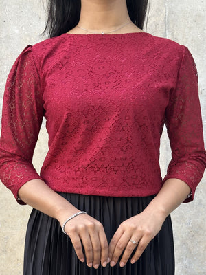 woman wearing maroon lace elegant top trendy buzz