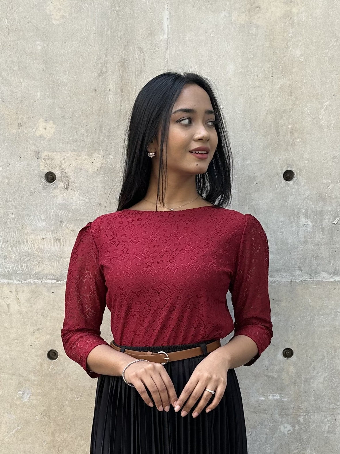 woman wearing elegant maroon lace top trendy buzz