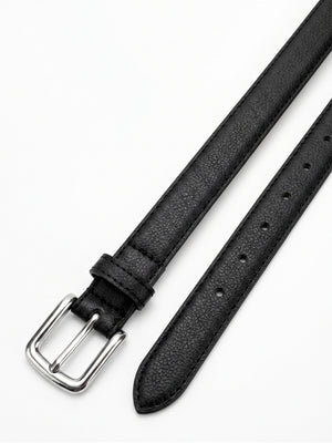 A close-up of a black textured leather watch strap with a silver-tone metal buckle, laid diagonally on a clean white background.