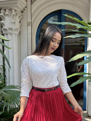 woman wearing white floral lace elegant top trendy buzz