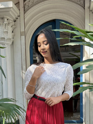 woman wearing white floral lace elegant top trendy buzz
