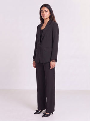 Premium black blazer with lace-attached sleeves for women. Trendy Buzz BD.