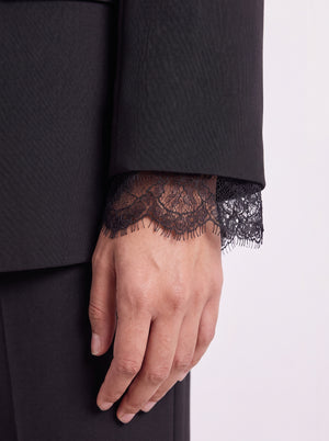 Premium black blazer with lace-attached sleeves for women. Trendy Buzz BD.