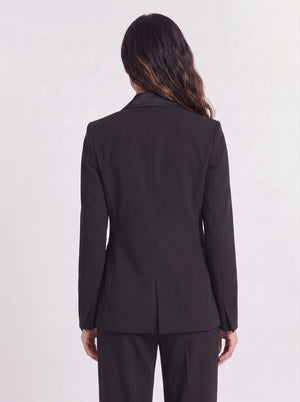 Premium 6 button double-breasted black blazer for women with satin-like lapels and flap pockets. trendy buzz bd.