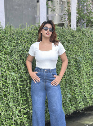Women's Trendy Wide Leg Jeans in Dark Blue with high-waist fit, premium denim fabric, front and back pockets, and belt loops by Trendy Buzz.