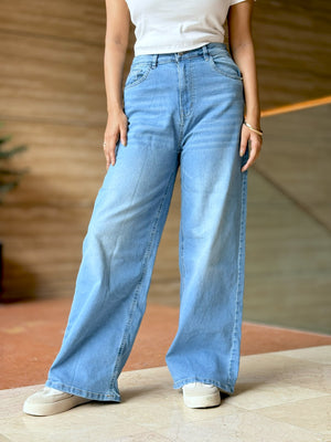 Women's Trendy Wide Leg Jeans in Light Blue with high-waist fit, front and back pockets, belt loops and relaxed wide-leg silhouette by Trendy Buzz.
