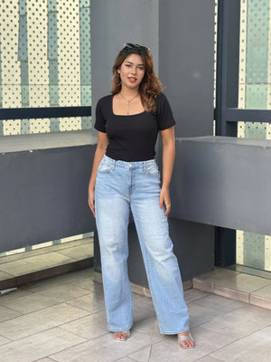 Women's Wide Leg Baggy Jeans in Light Blue with high-waist fit, back elastic waistband, front and back pockets, belt loops, and premium denim fabric by Trendy Buzz