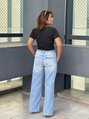 Women's Wide Leg Baggy Jeans in Light Blue with high-waist fit, back elastic waistband, front and back pockets, belt loops, and premium denim fabric by Trendy Buzz