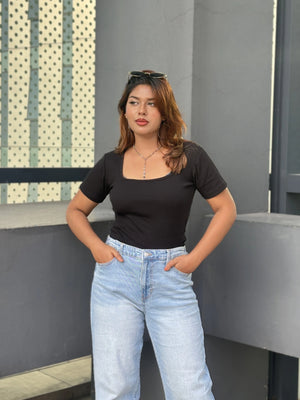 Women's Wide Leg Baggy Jeans in Light Blue with high-waist fit, back elastic waistband, front and back pockets, belt loops, and premium denim fabric by Trendy Buzz