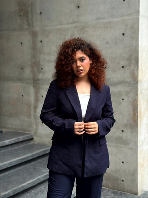 Women's dark navy all-over print blazer with single-button closure and structured fit