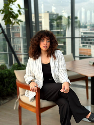 Women’s white pinstripe linen blazer with black stripes and front pockets