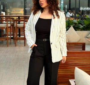 Women’s white pinstripe linen blazer with black stripes and front pockets