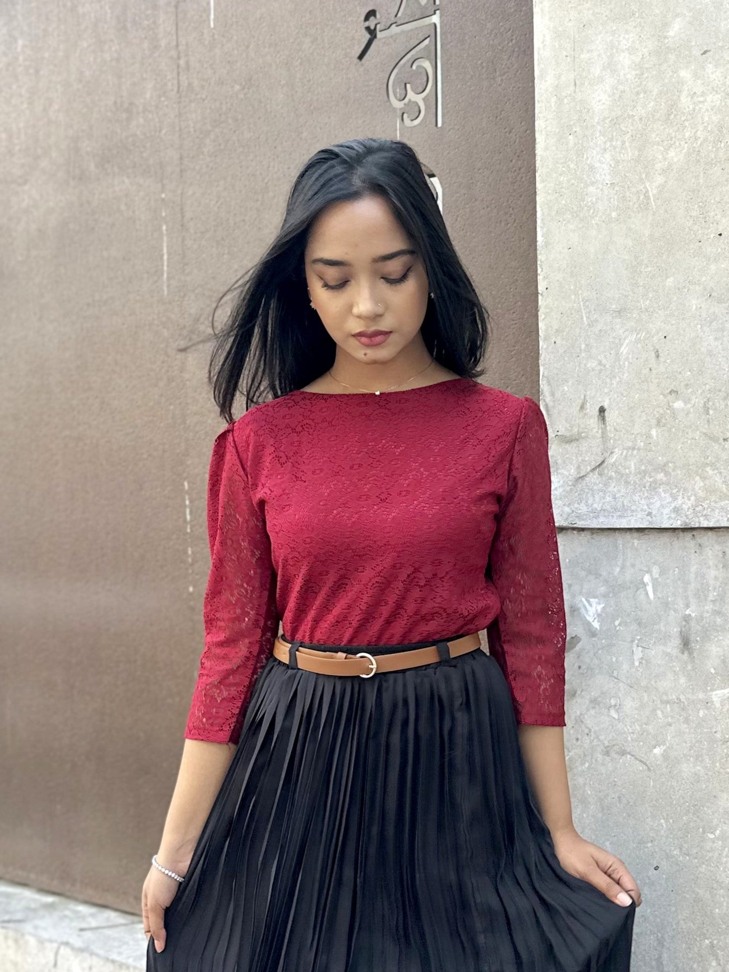 woman wearing maroon lace elegant top trendy buzz