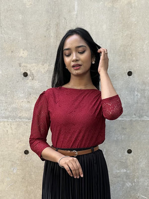woman wearing elegant maroon lace top trendy buzz
