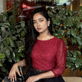 woman wearing elegant maroon lace top trendy buzz