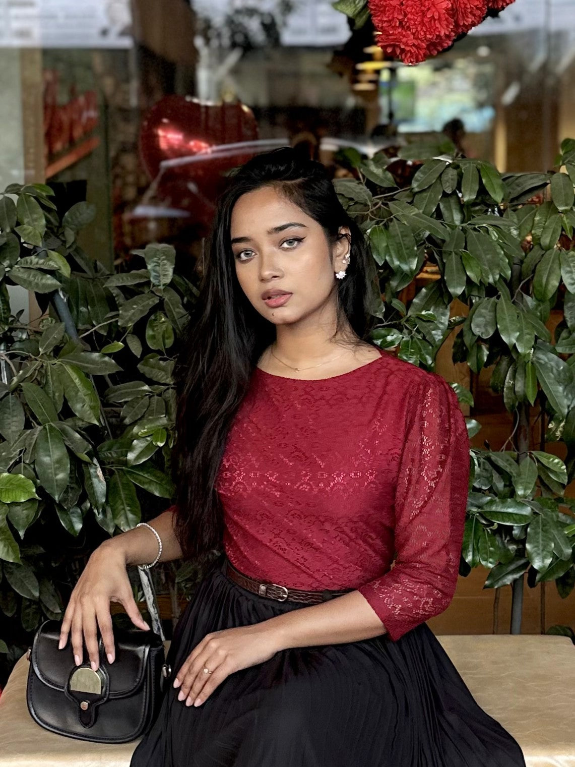 woman wearing elegant maroon lace top trendy buzz