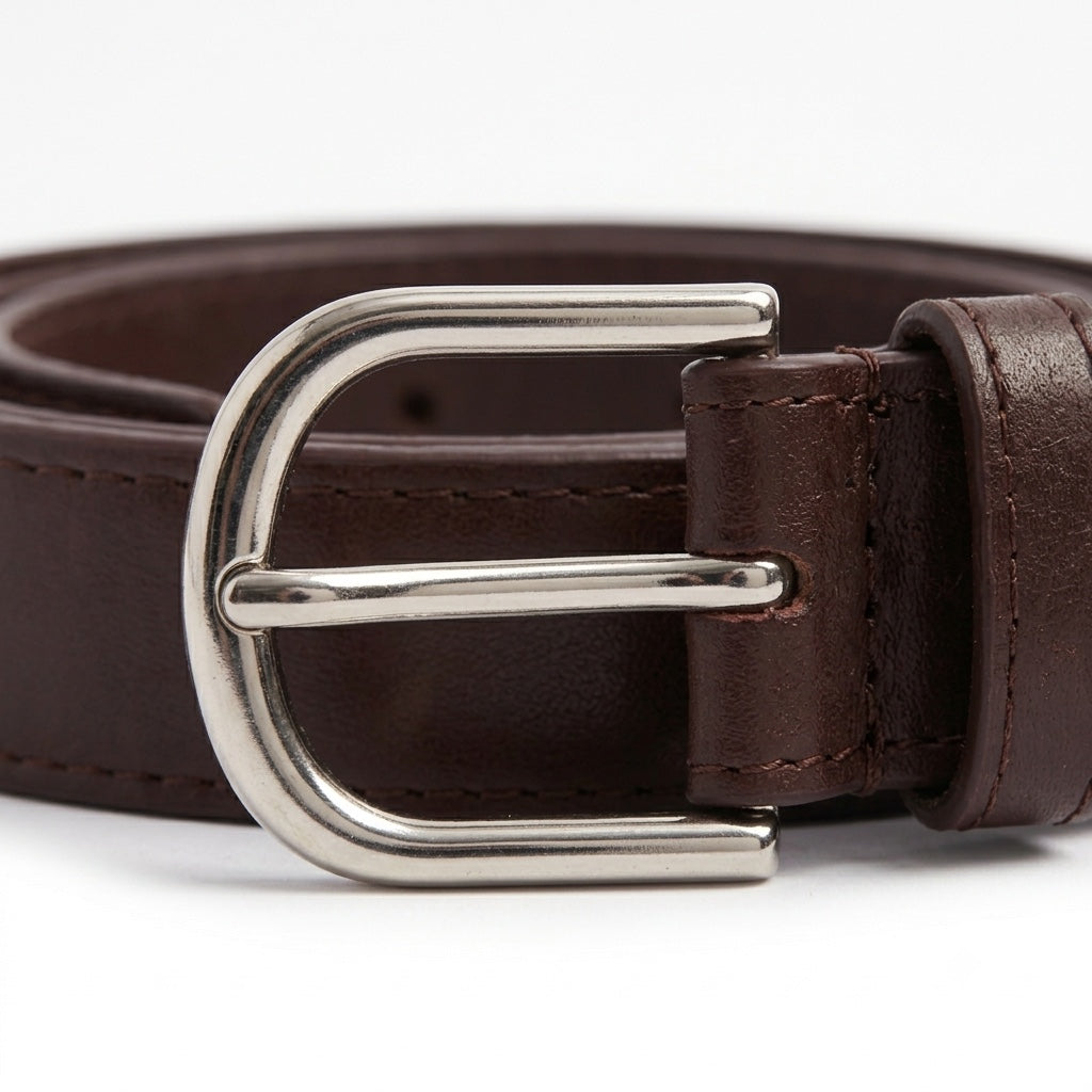 A close-up of a dark brown leather belt with a polished silver-tone metal buckle, shown on a clean white background.