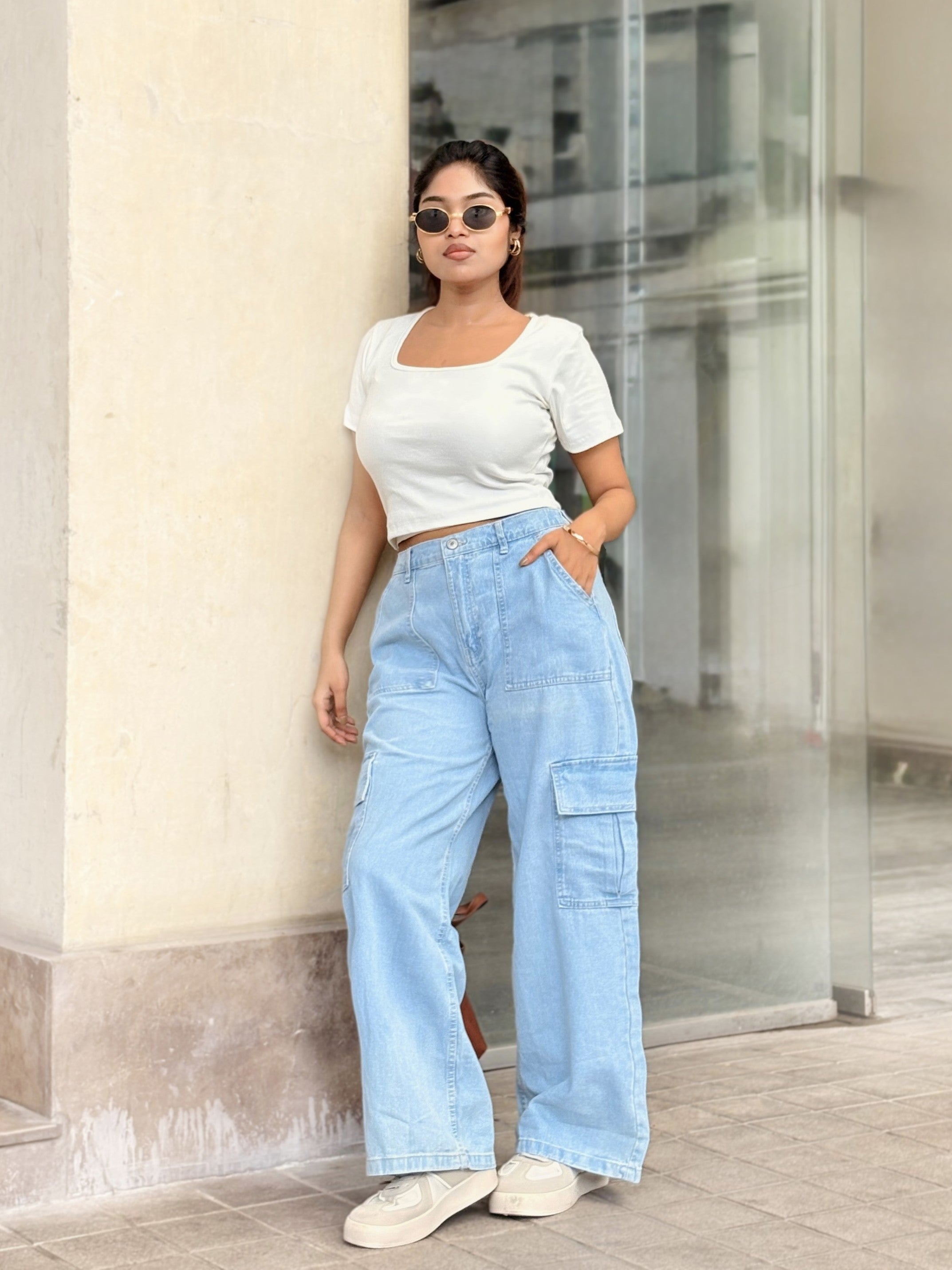 Women's Light Blue Cargo Straight Jeans with high-waist fit, straight-leg design and cargo pockets by Trendy Buzz.
