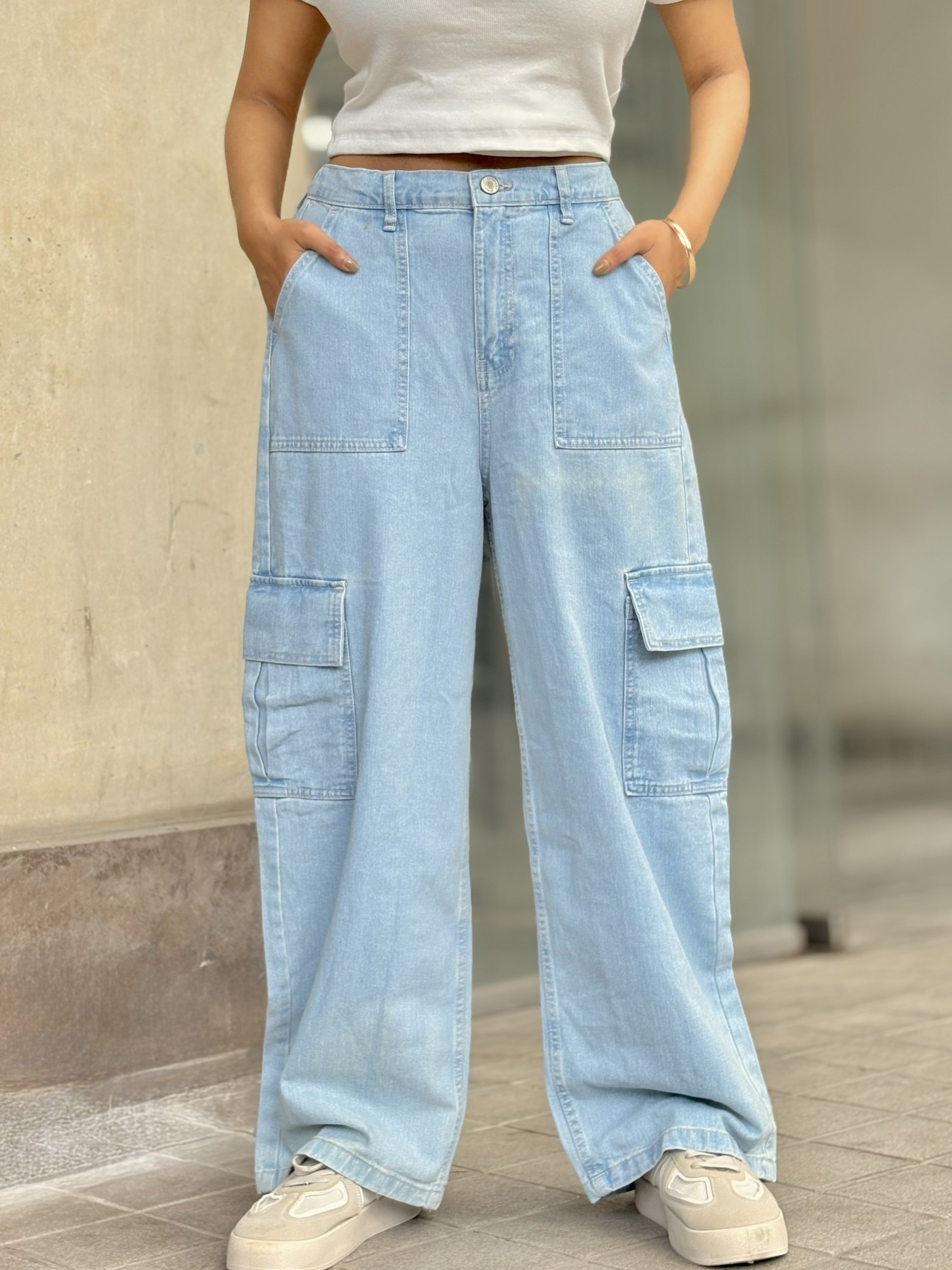 Women's Light Blue Cargo Straight Jeans with high-waist fit, straight-leg design and cargo pockets by Trendy Buzz.