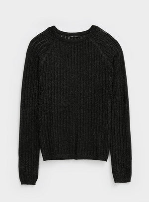 Woman wearing a black textured mesh top which is glittery for party use. trendy buzz bd.