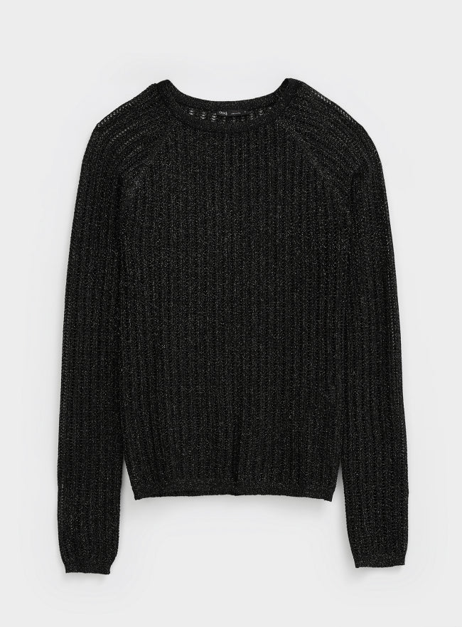 Woman wearing a black textured mesh top which is glittery for party use. trendy buzz bd.