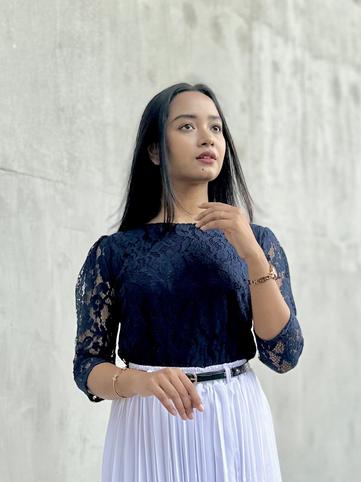 woman wearing navy blue lace top trendy buzz