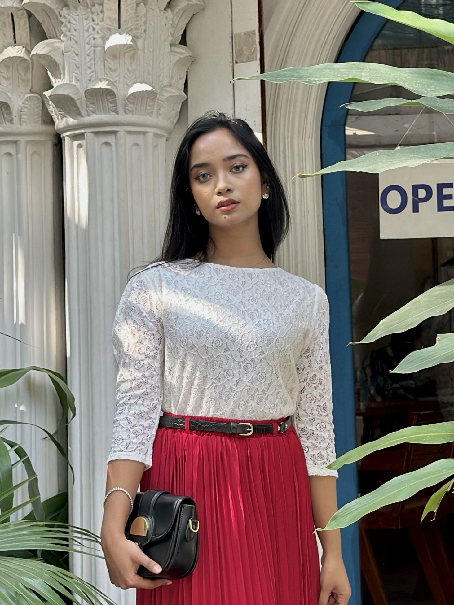 woman wearing white floral lace elegant top trendy buzz