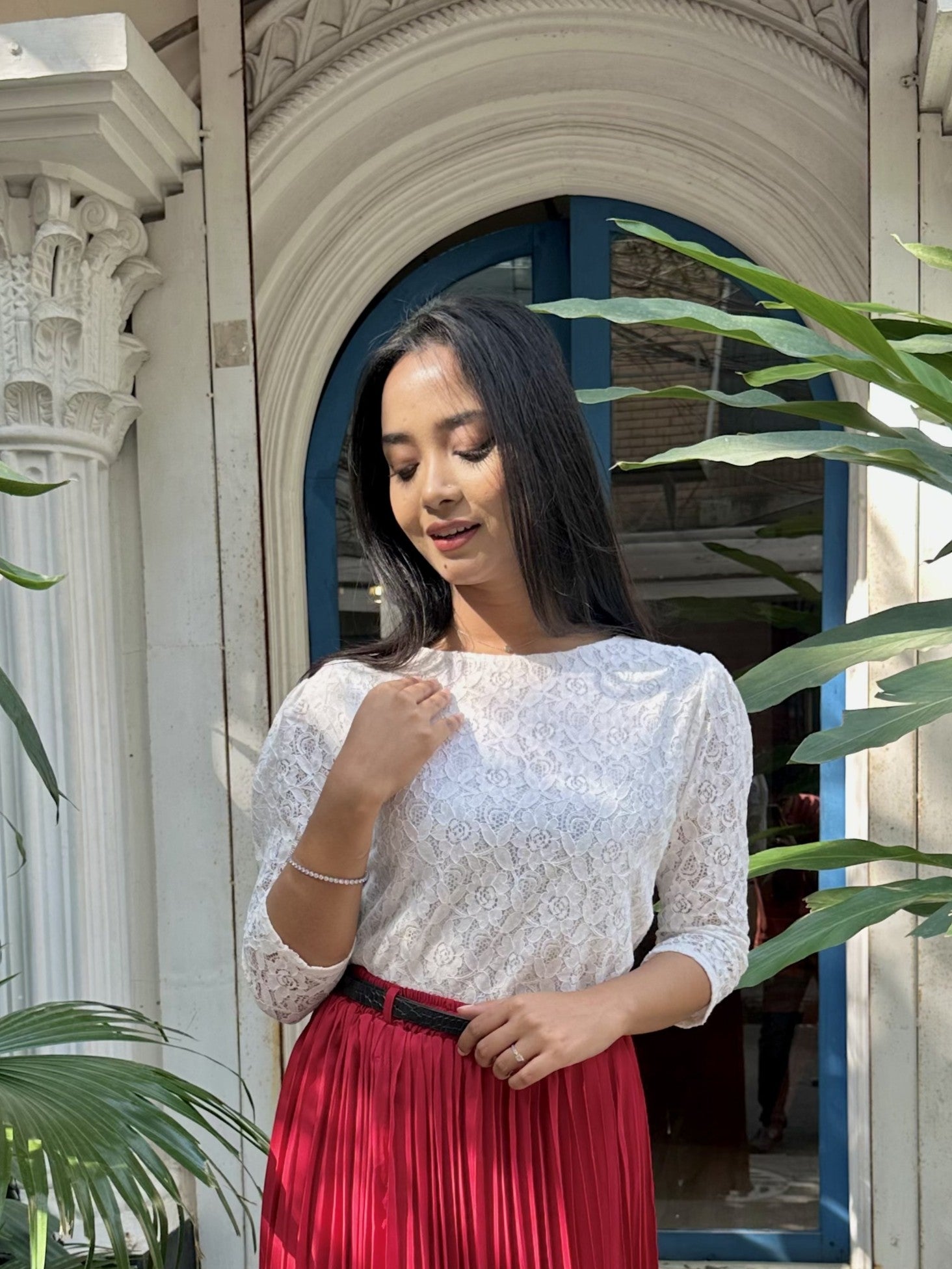 woman wearing white floral lace elegant top trendy buzz