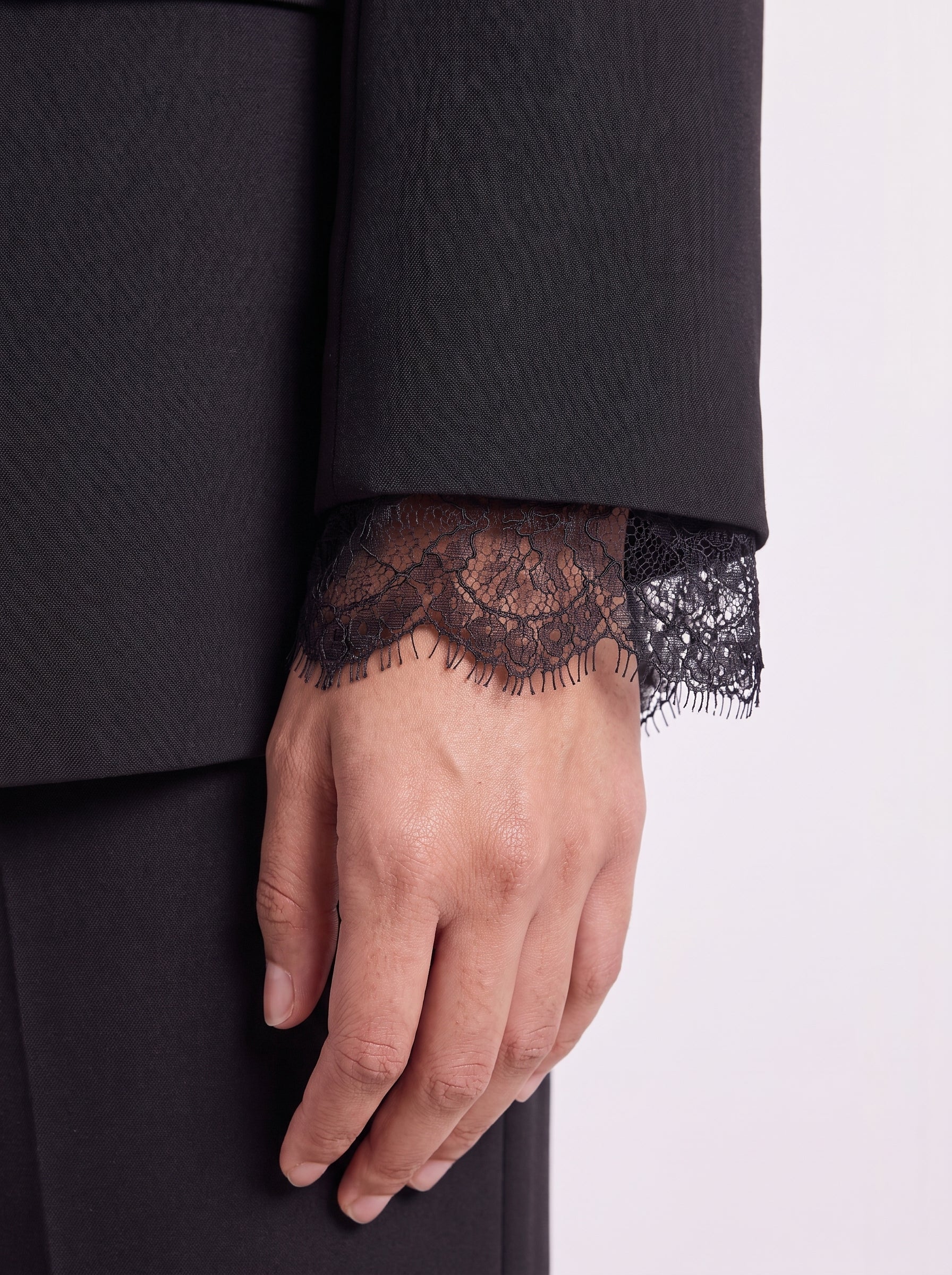 Premium black blazer with lace-attached sleeves for women. Trendy Buzz BD.