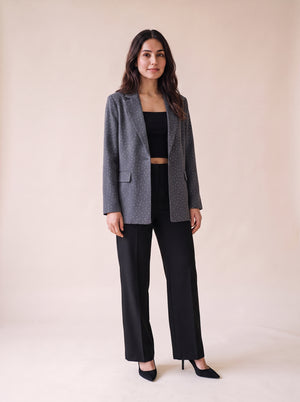 Ladies stone work party blazer in gray color styled with black wide leg pants and black crop top. Trendy Buzz BD.