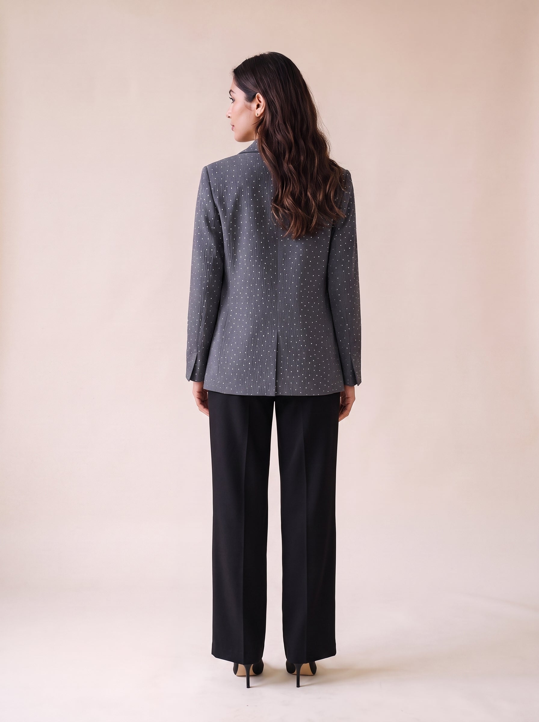 Ladies stone work party blazer in gray color styled with black wide leg pants and black crop top. Trendy Buzz BD.