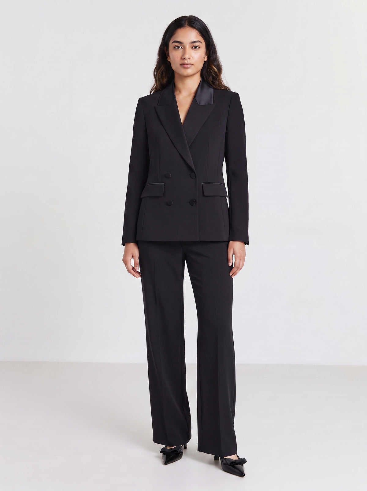 Premium 6 button double-breasted black blazer for women with satin-like lapels and flap pockets. trendy buzz bd.