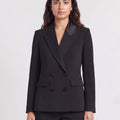 Premium 6 button double-breasted black blazer for women with satin-like lapels and flap pockets. trendy buzz bd.
