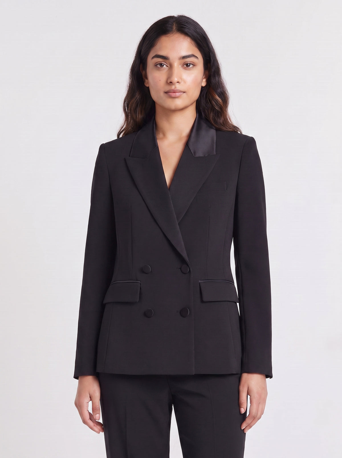 Premium 6 button double-breasted black blazer for women with satin-like lapels and flap pockets. trendy buzz bd.