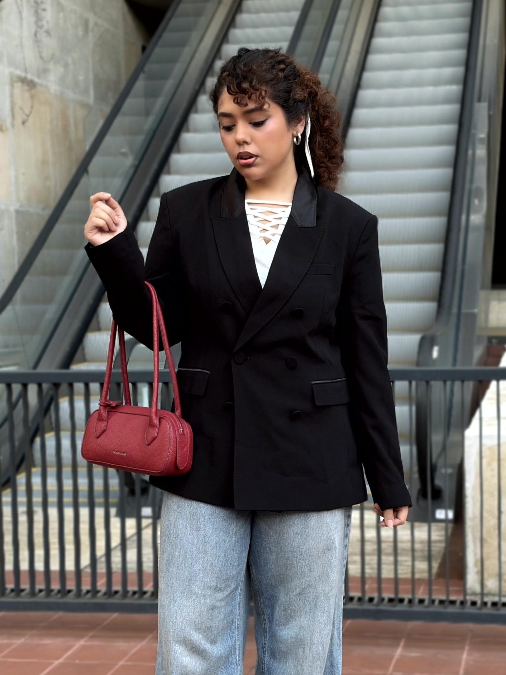 Premium 6 button double-breasted black blazer for women with satin-like lapels and flap pockets