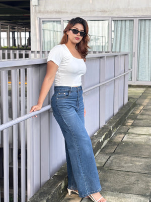 Women's Trendy Wide Leg Jeans in Dark Blue with high-waist fit, premium denim fabric, front and back pockets, and belt loops by Trendy Buzz.