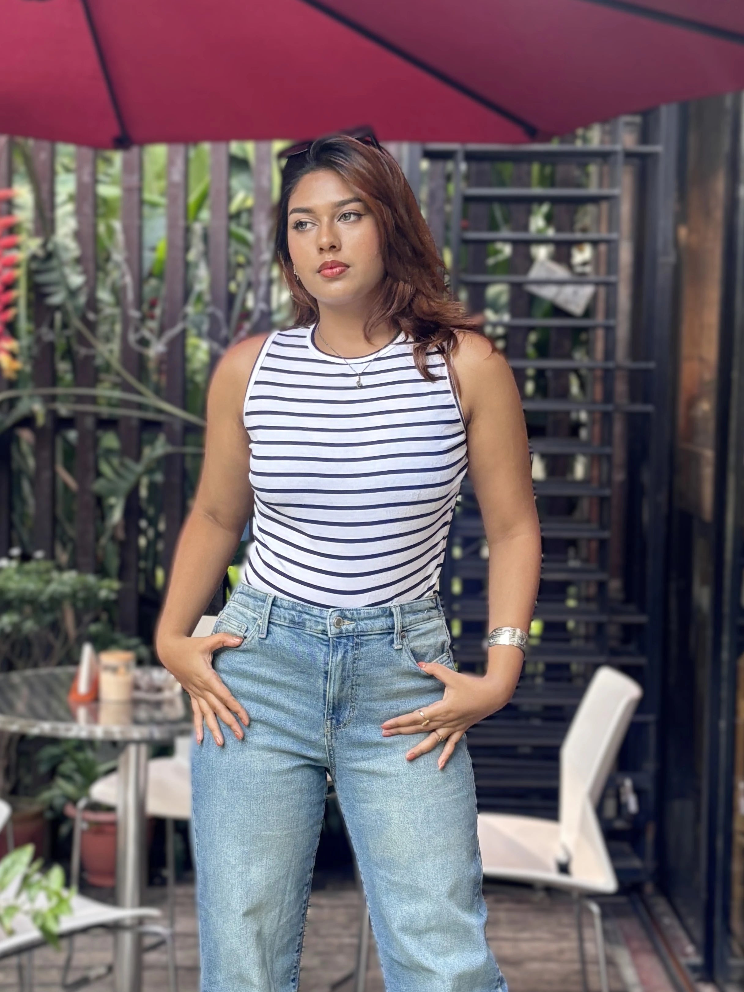 Women's Trendy Wide Leg Jeans in Mid Tint Blue with high-waist fit, premium denim fabric, front and back pockets, and belt loops by Trendy Buzz.