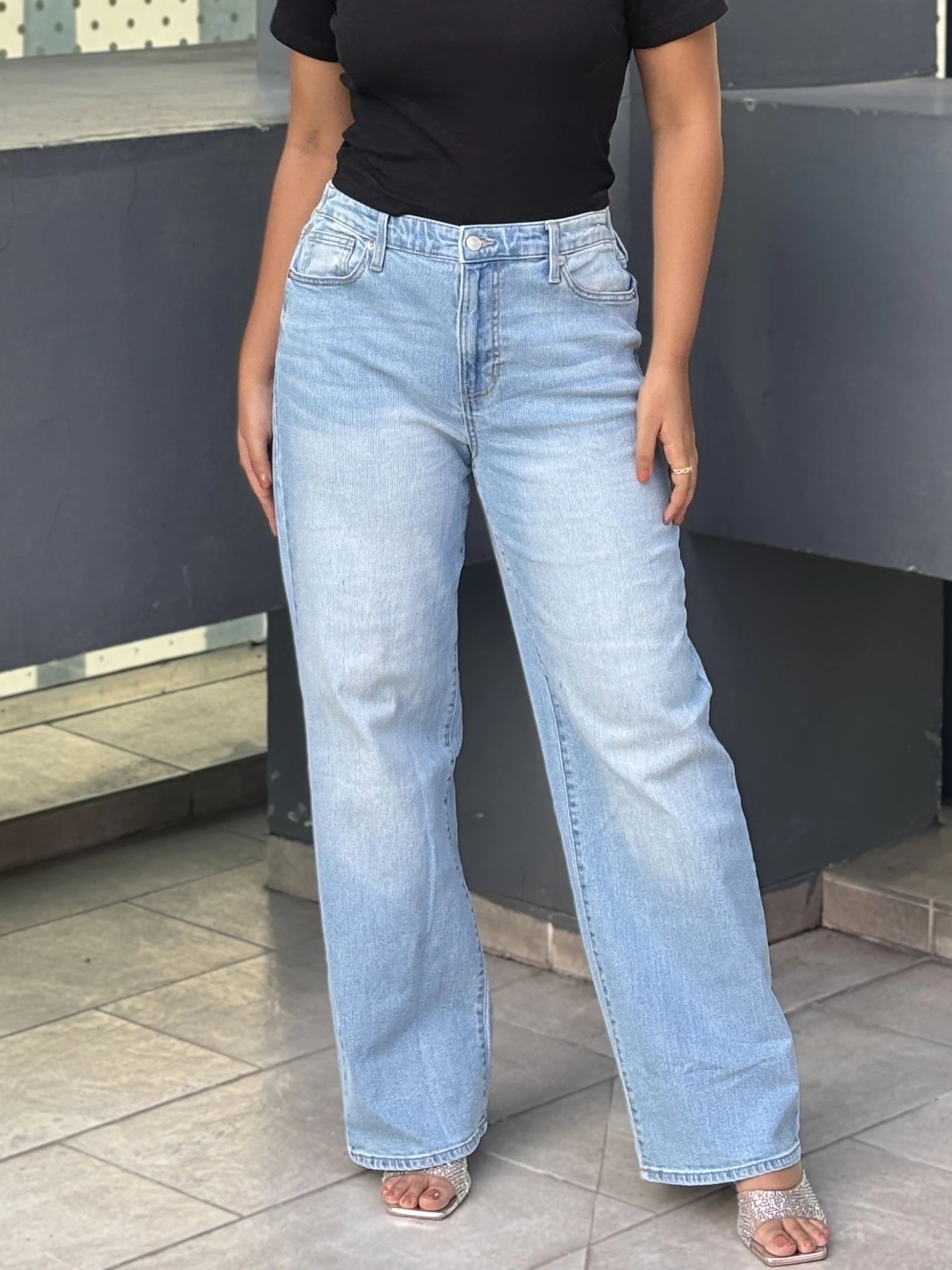 Women's Wide Leg Baggy Jeans in Light Blue with high-waist fit, back elastic waistband, front and back pockets, belt loops, and premium denim fabric by Trendy Buzz