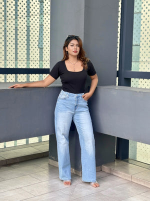 Women's Wide Leg Baggy Jeans in Light Blue with high-waist fit, back elastic waistband, front and back pockets, belt loops, and premium denim fabric by Trendy Buzz