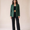 Women's 1 button solid green blazer with structured silhouette. trendy buzz bd. 