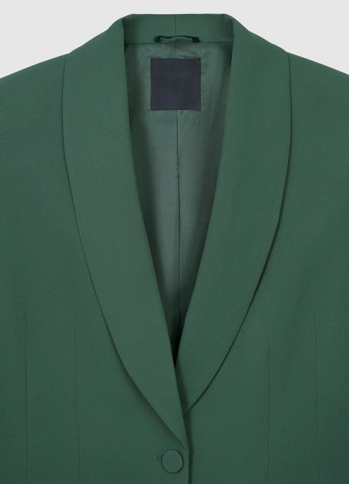 Women's 1 button solid green blazer with structured silhouette. trendy buzz bd. 