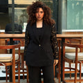 Women wearing premium black lace sleeve blazer with gold-tone button
