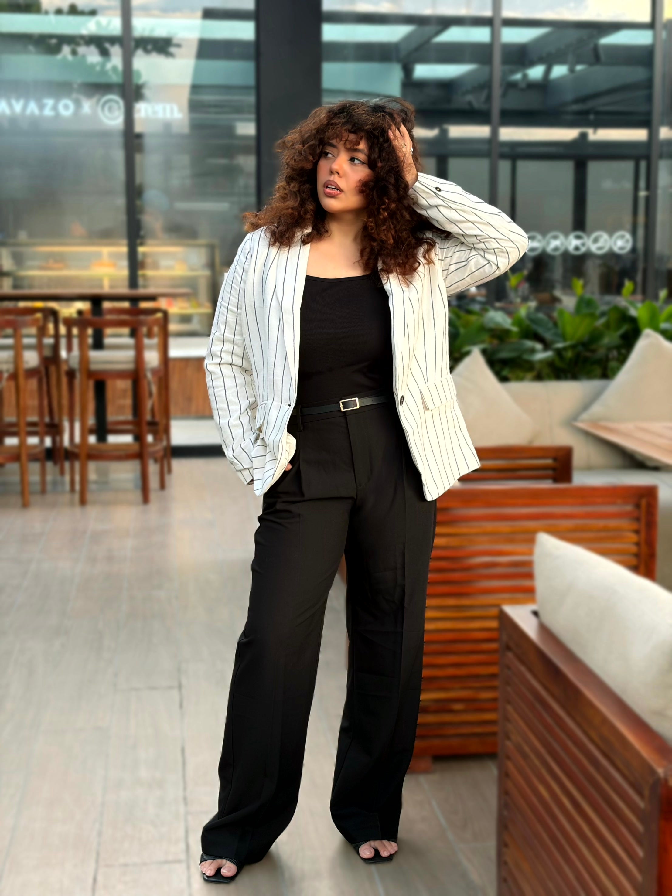 Women’s white pinstripe linen blazer with black stripes and front pockets