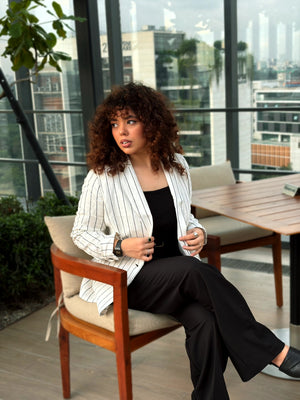 Women’s white pinstripe linen blazer with black stripes and front pockets